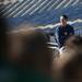 Rusty Chavey during Mass at Michigan Stadium. Chavey's son, Joseph, is a freshman at Father Gabriel Richard. "It's not my favorite way to wake up on a Sunday, but it builds community and good citizenship," Chavey says. Daniel Brenner I AnnArbor.com